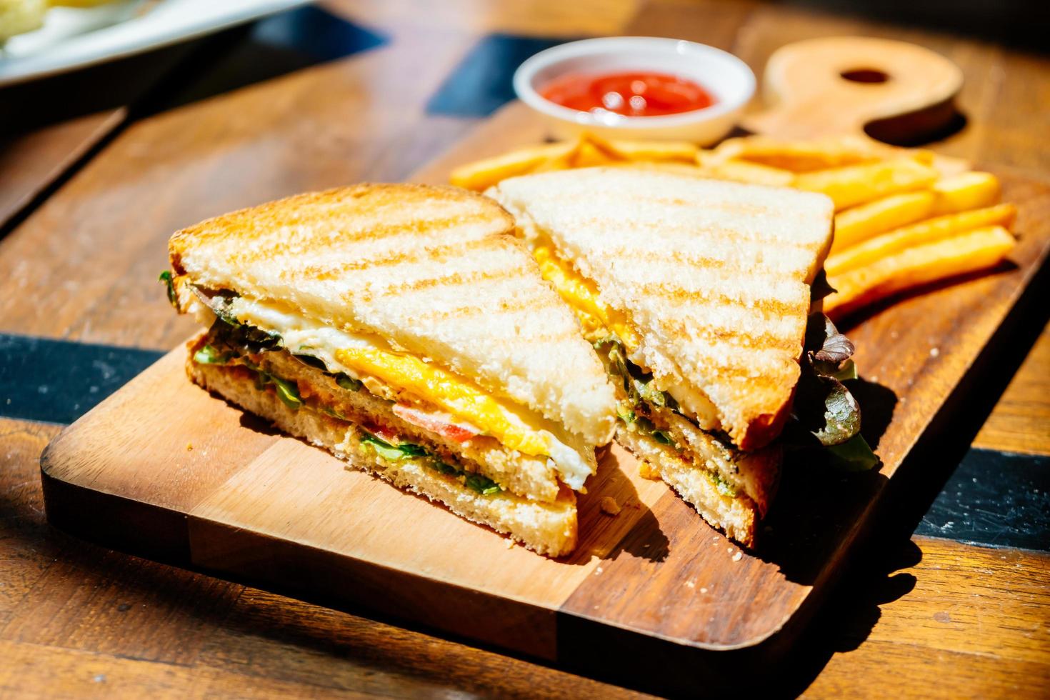 Club sandwich with french fries photo