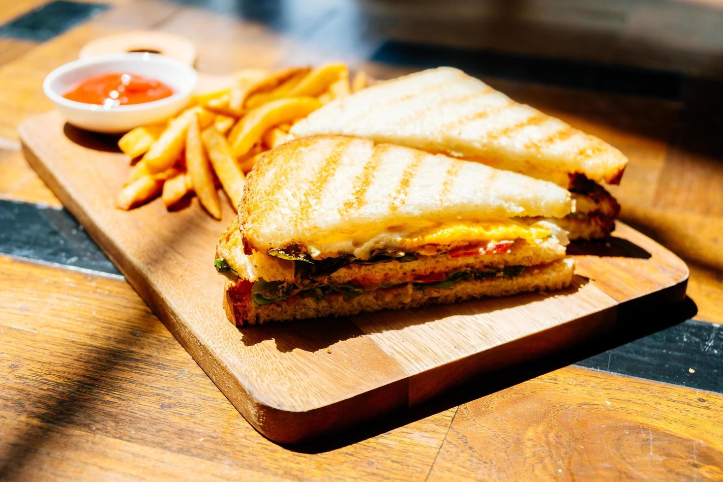 Club sandwich with french fries photo