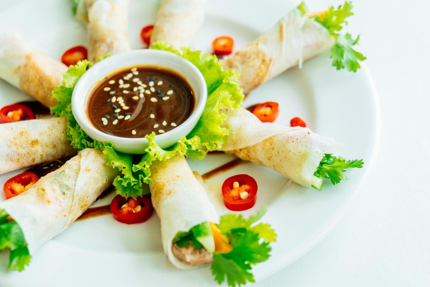 Duck meat inside spring roll photo