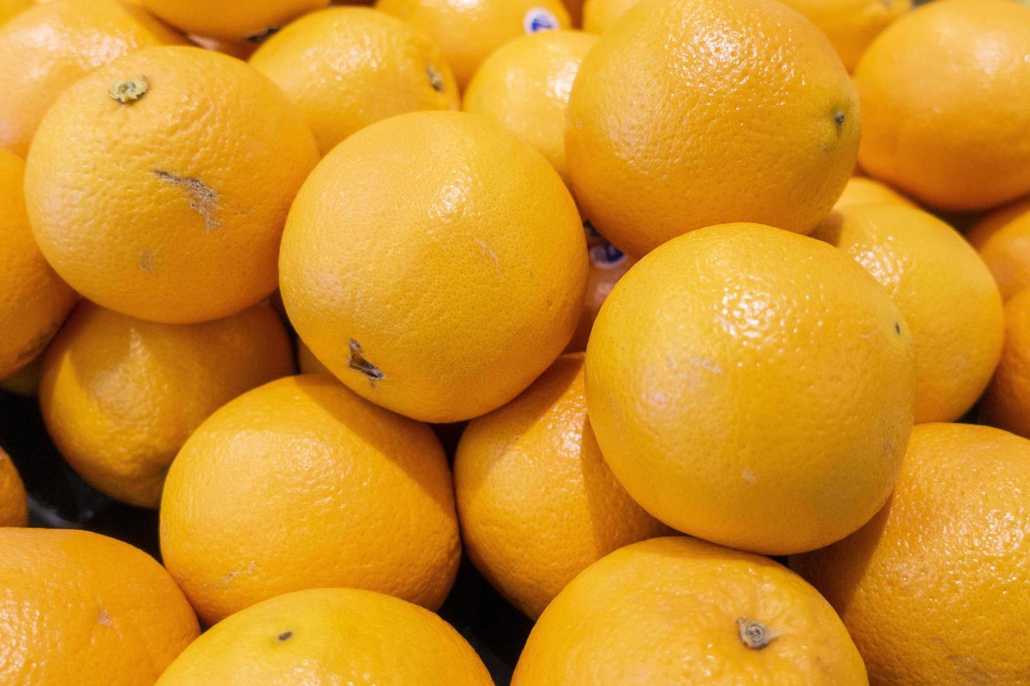 Oranges in supermarket photo