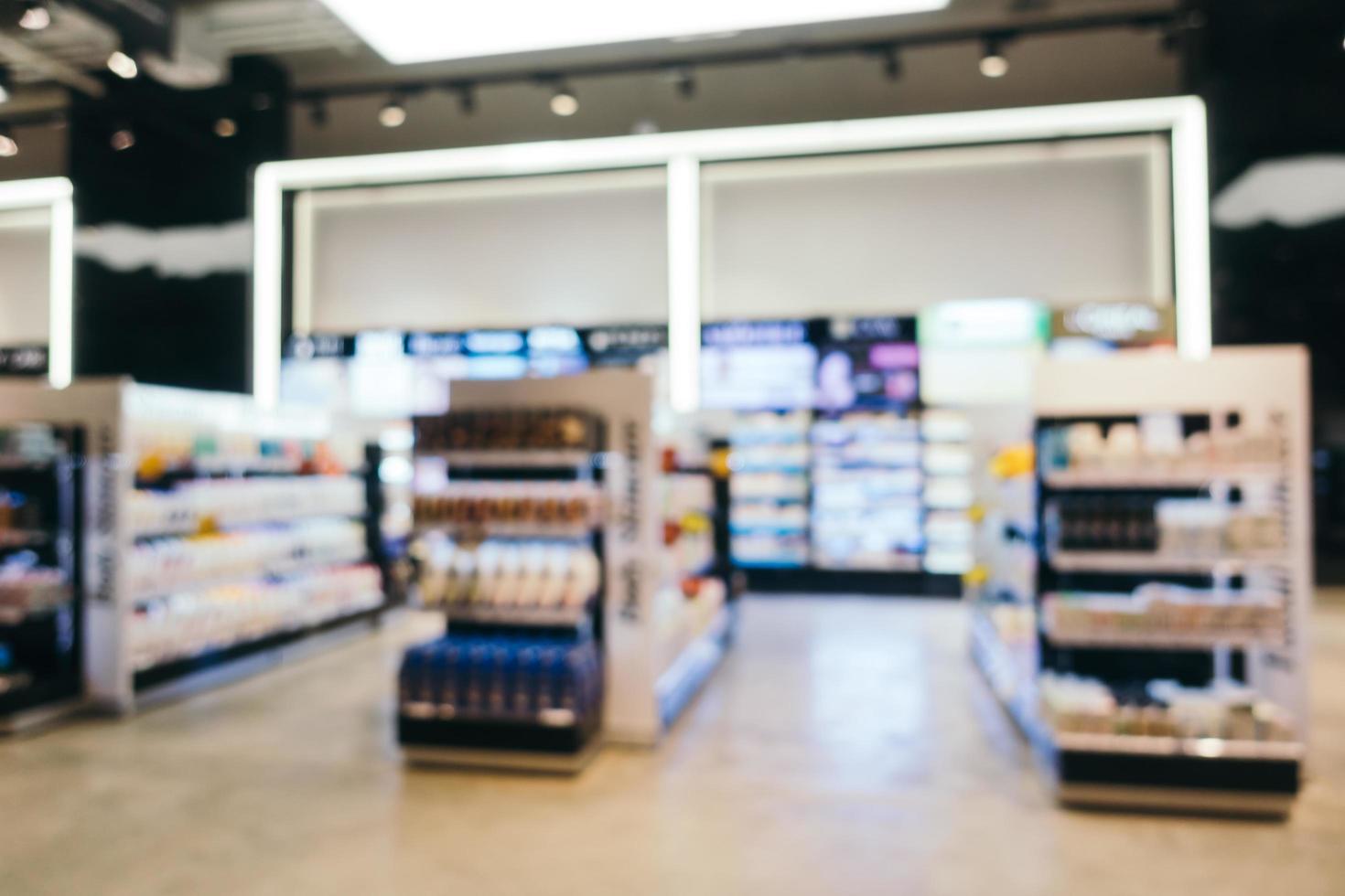 Abstract blur and defocused supermarket shopping in department store photo