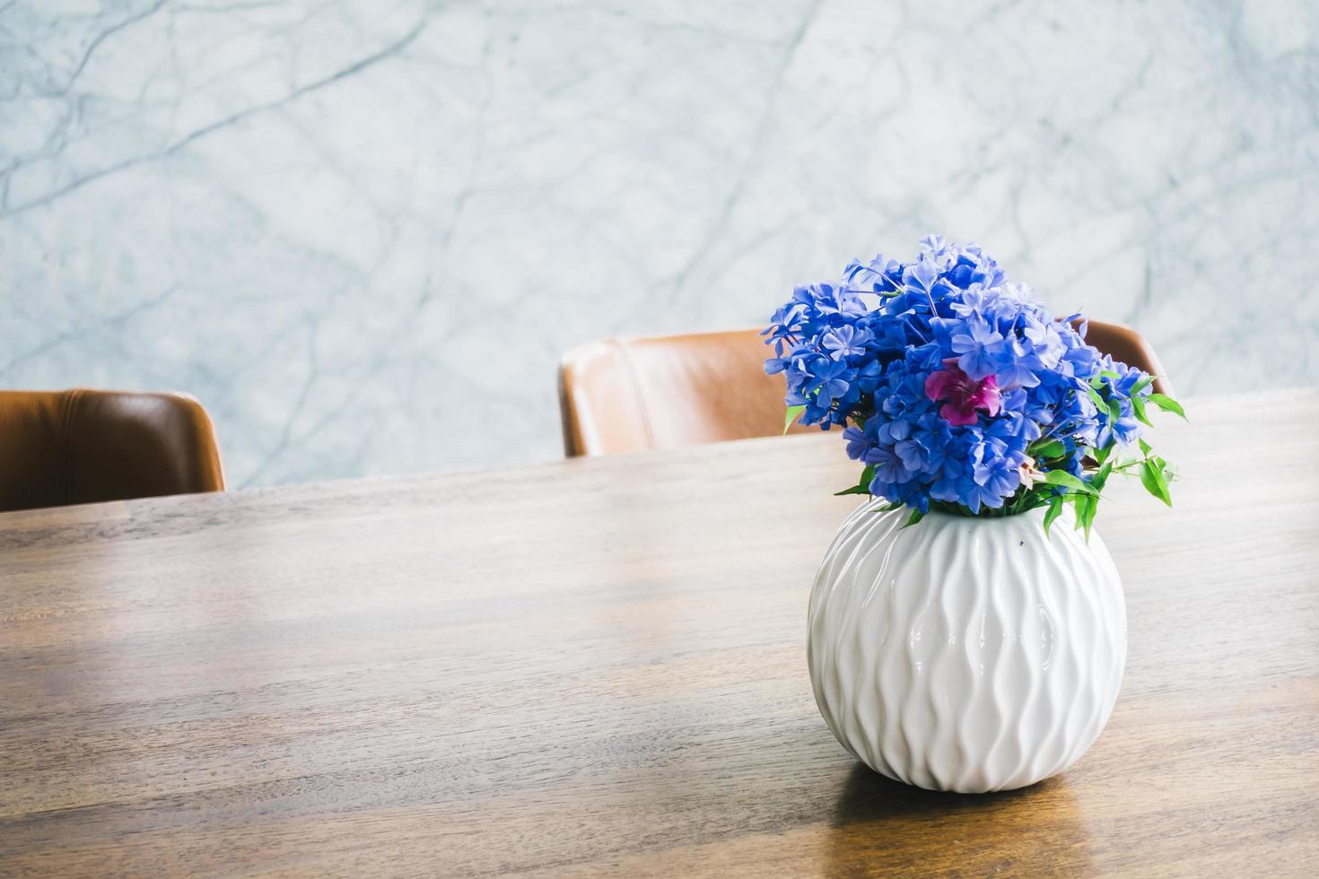 Flower vase on table photo