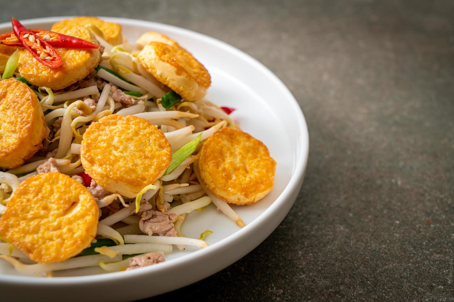 Stir-fried bean sprout, egg tofu and minced pork - Asian food style photo