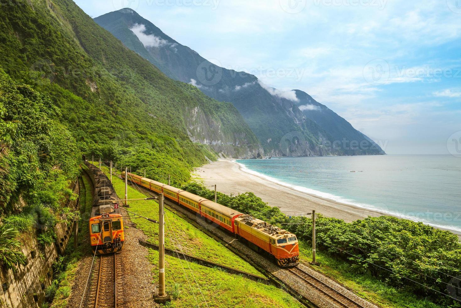 Trains at eastern coastline near Qingshui cliff, Hualien, Taiwan photo