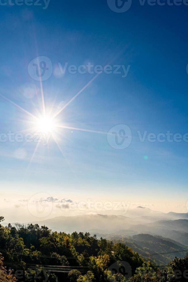 Beautiful mountain layer with clouds and sunrise at Chiang Mai in Thailand photo