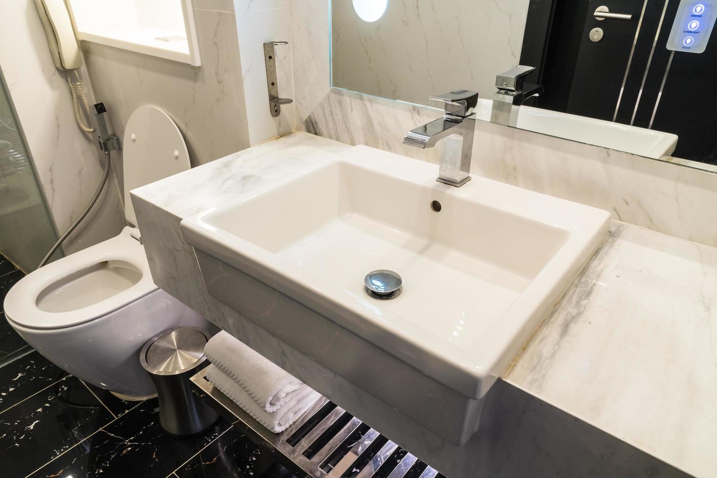 White sink and faucet decoration in bathroom photo