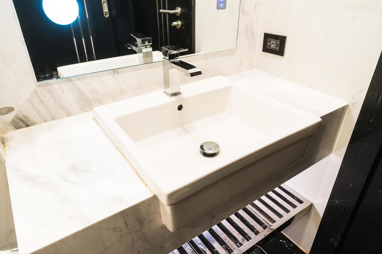 White sink and faucet decoration in bathroom photo