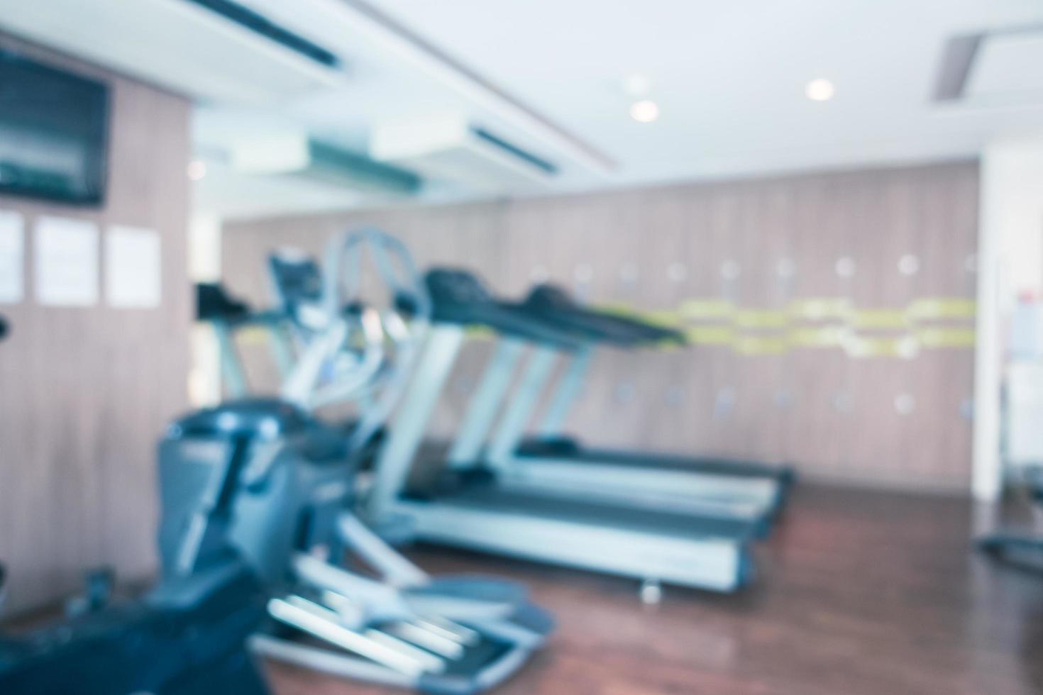 Abstract blur defocused fitness equipment and gym interior photo