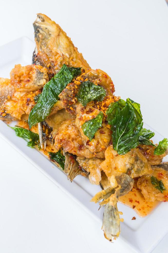 Fried fish with spicy sauce photo