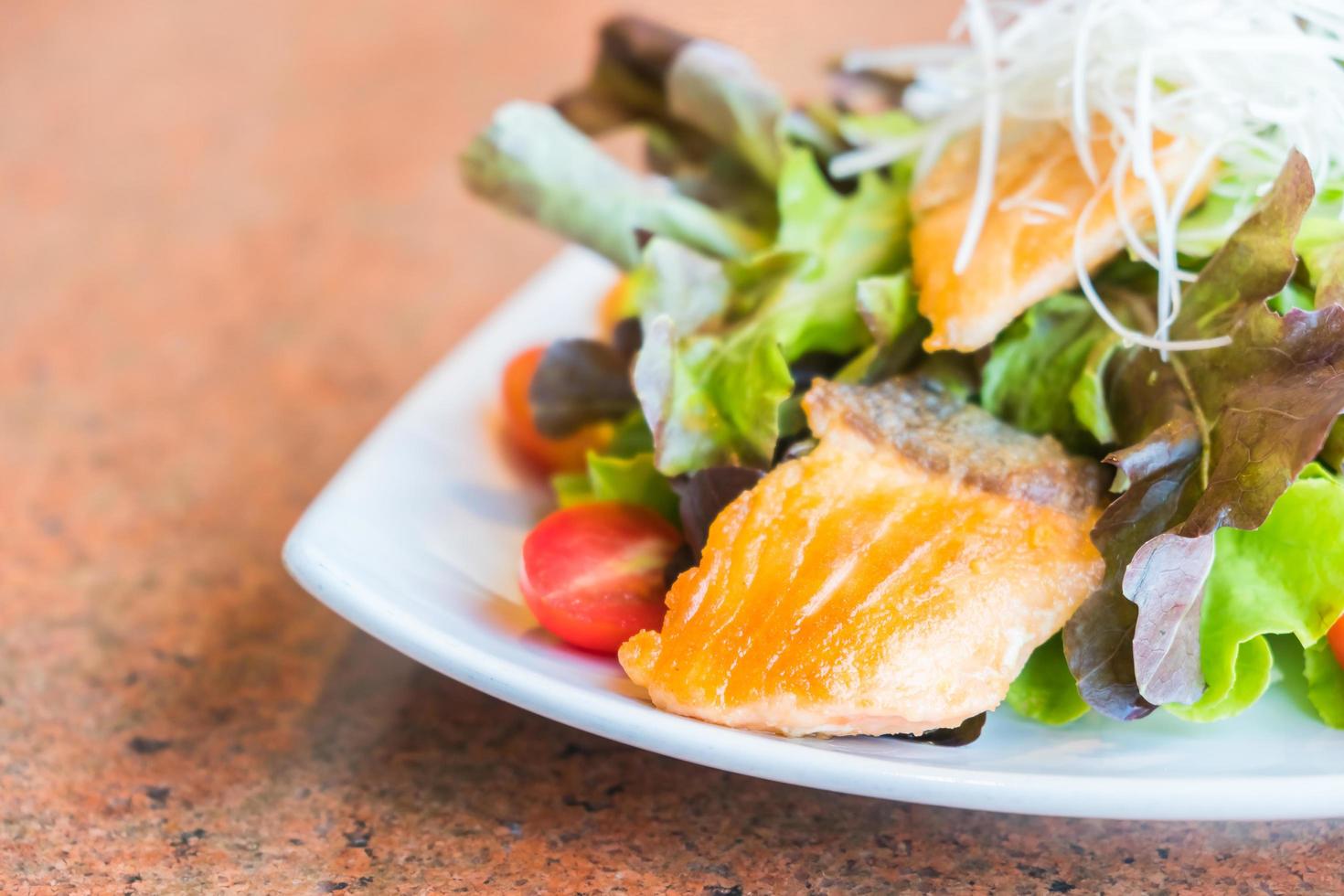 Fried salmon salad photo