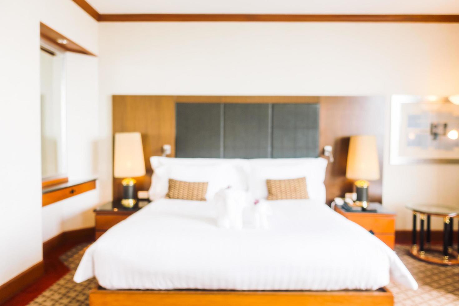 Abstract blur and defocused decoration in hotel bedroom interior photo