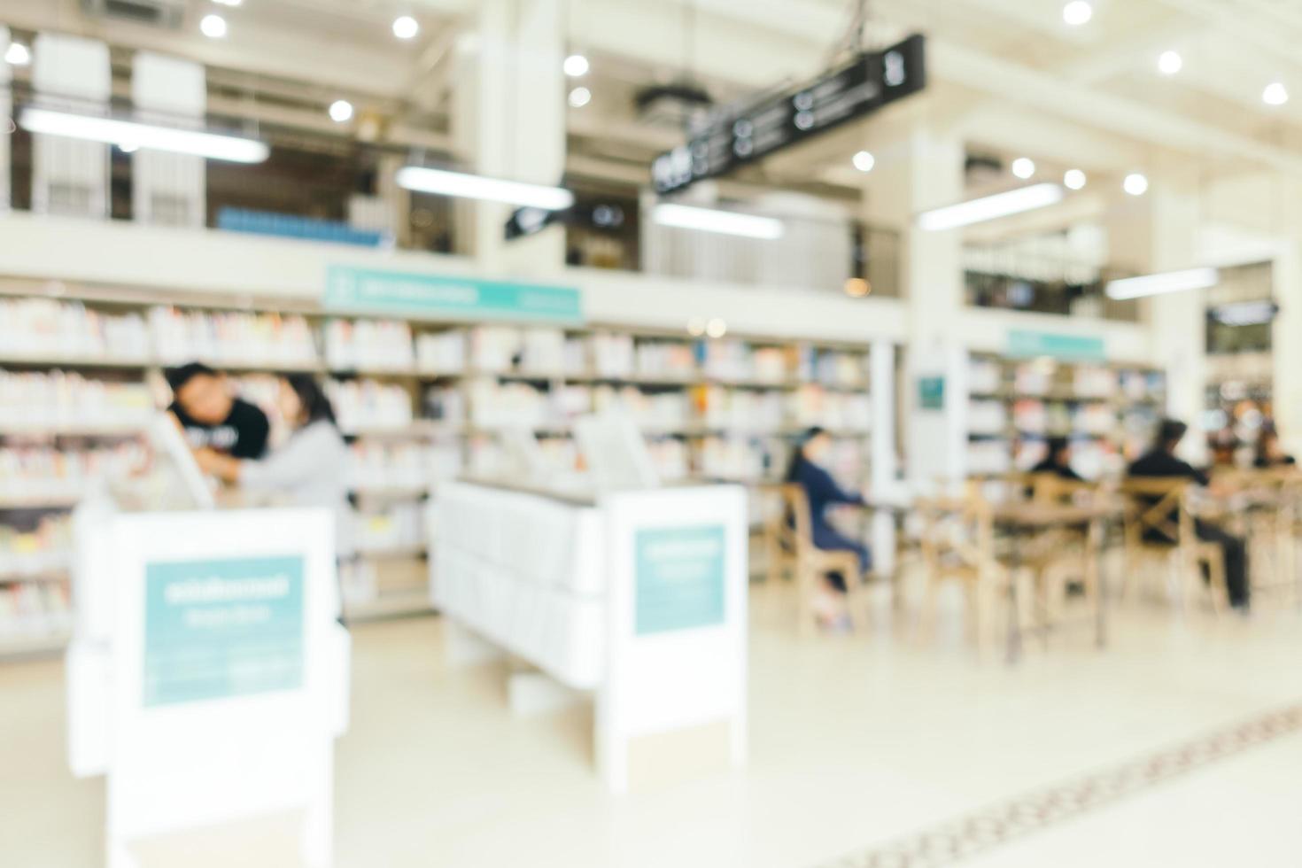 Abstract blur and defocused bookshelf in library photo