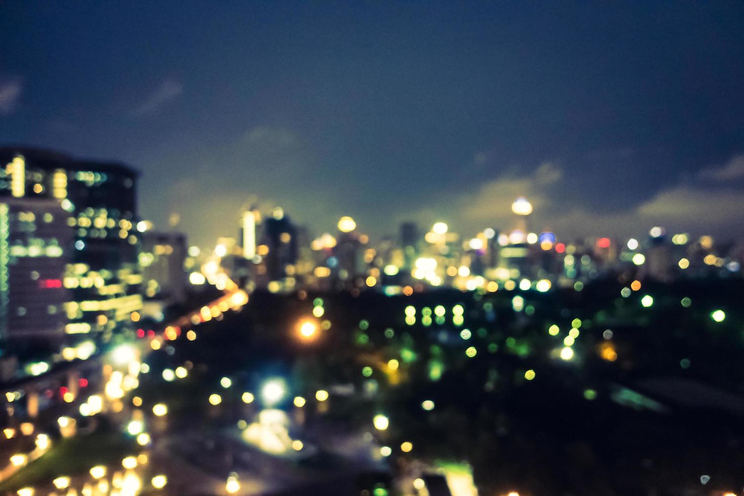 Abstract blur and defocused bangkok city at night in Thailand photo