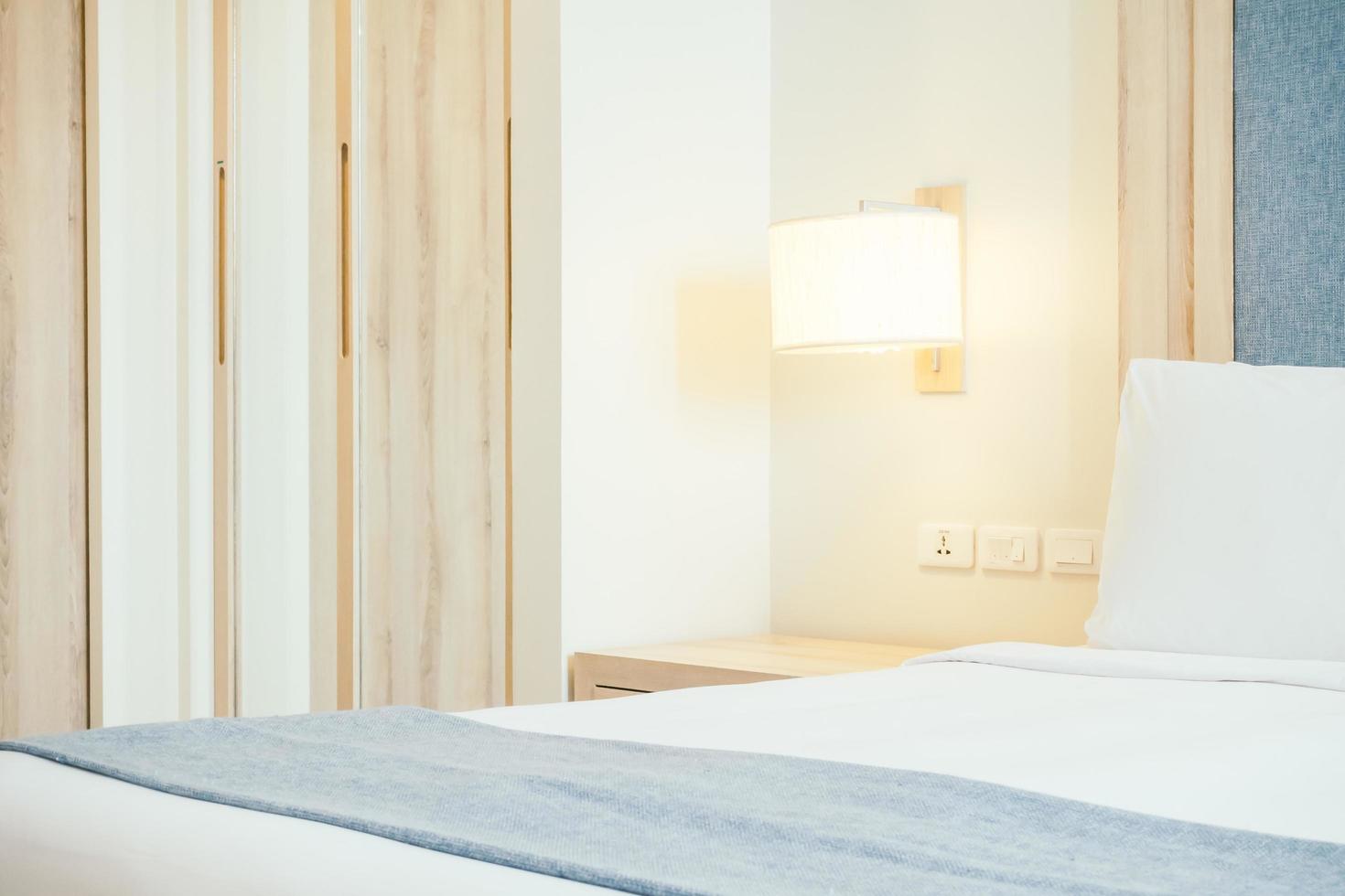 White pillow on bed photo