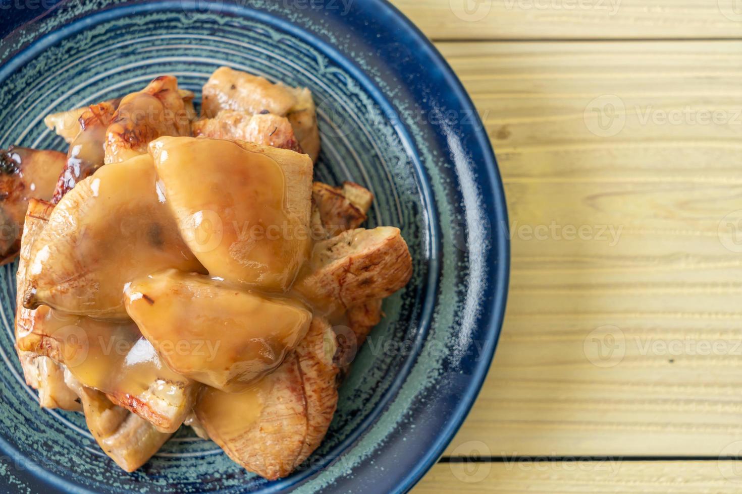 Grilled bananas with coconut caramel sauce on plate 2797663 Stock Photo at Vecteezy