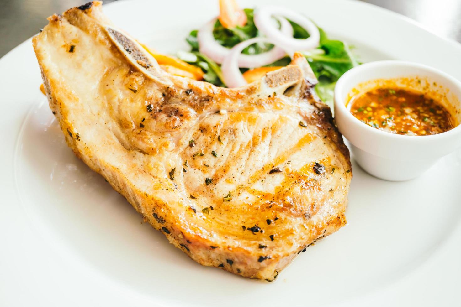 Grilled pork chop meat steak photo