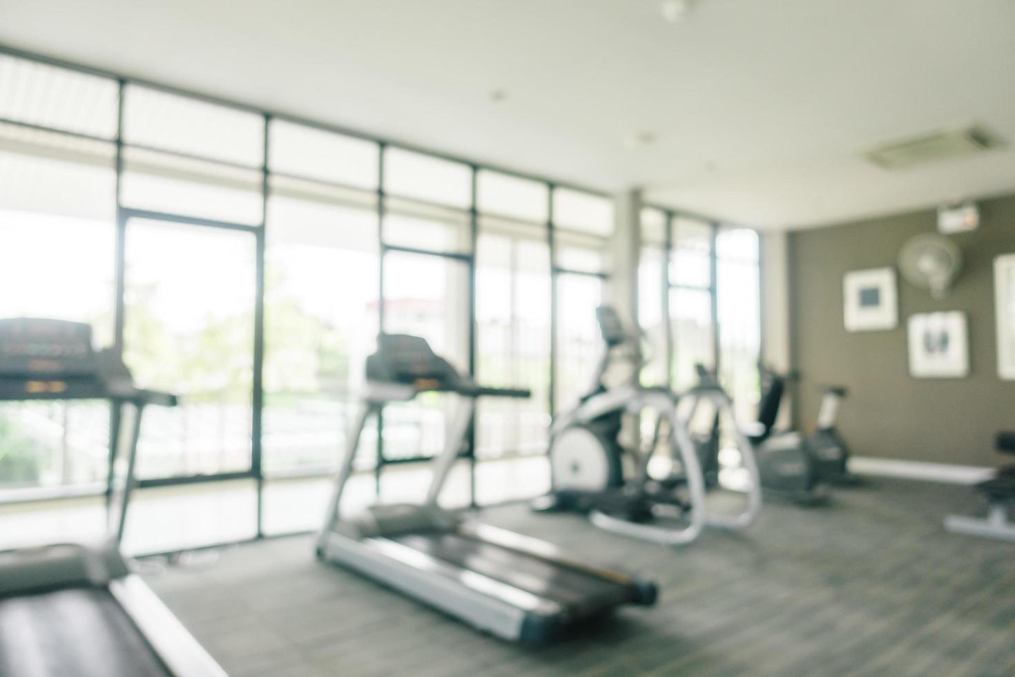 Abstract blur and defocused sport equipment in gym interior photo