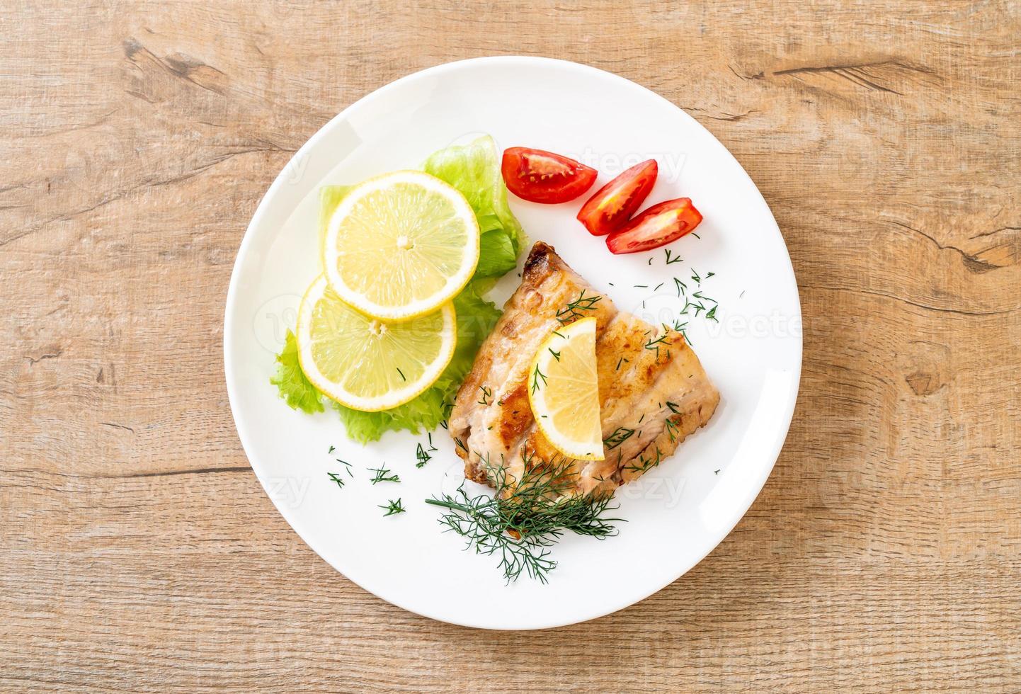 Grilled snapper fish steak with vegetable photo