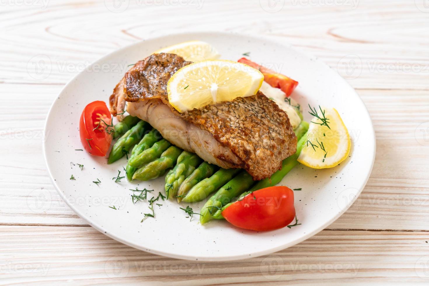 Grilled snapper fish steak with vegetable photo