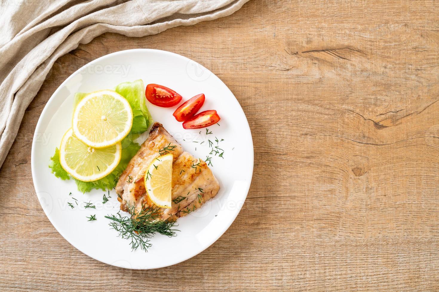 Grilled snapper fish steak with vegetable photo