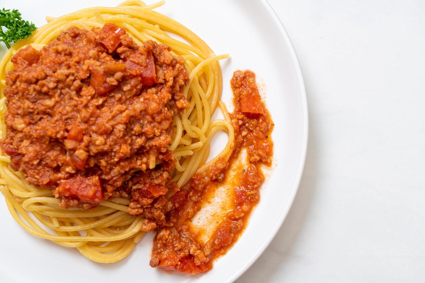 Spaghetti bolognese pork or spaghetti with minced pork tomato sauce - Italian food style photo