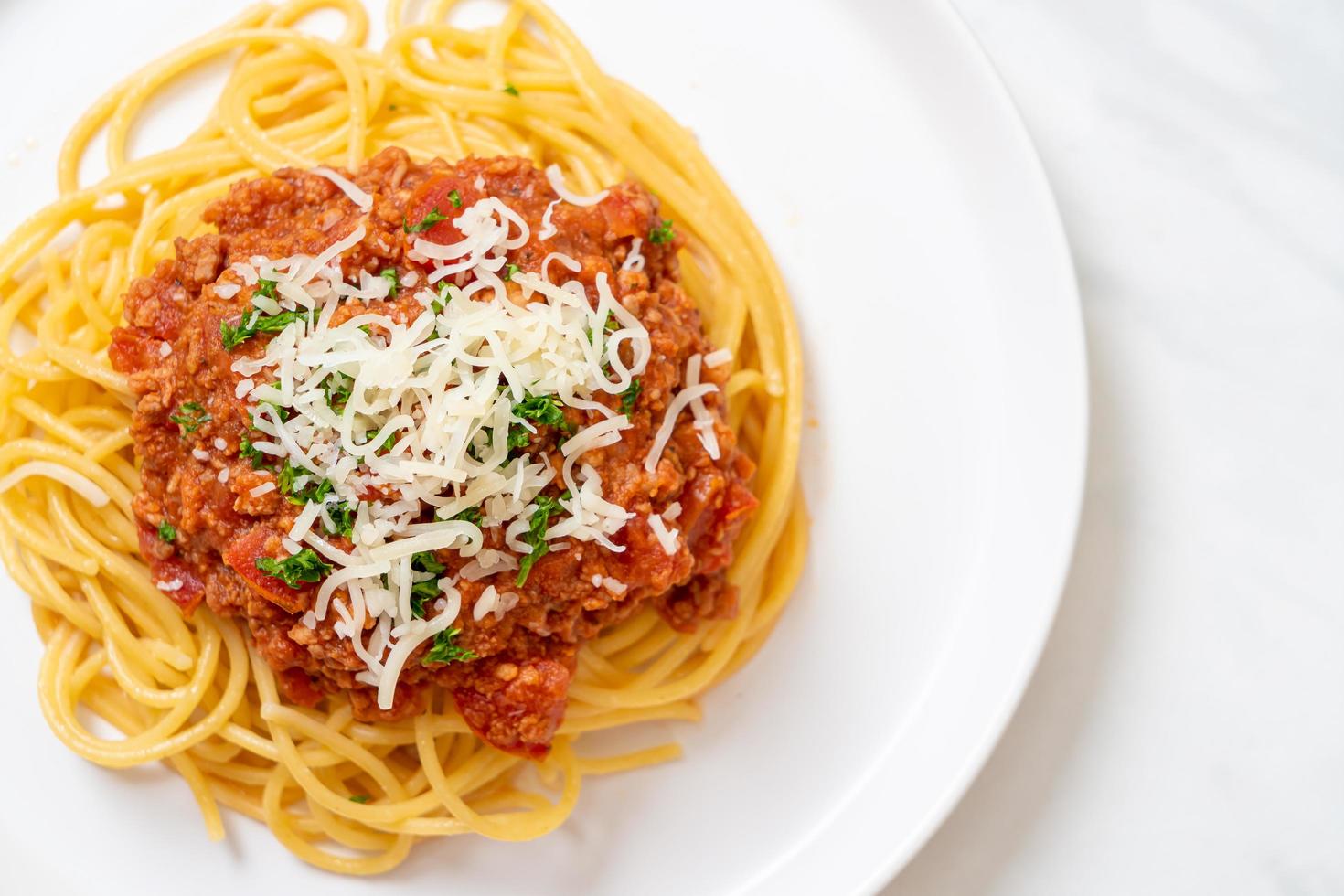 Spaghetti bolognese pork or spaghetti with minced pork tomato sauce - Italian food style photo