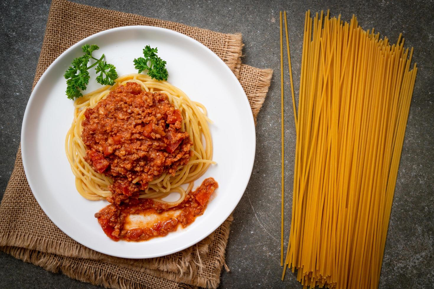 Spaghetti bolognese pork or spaghetti with minced pork tomato sauce - Italian food style photo