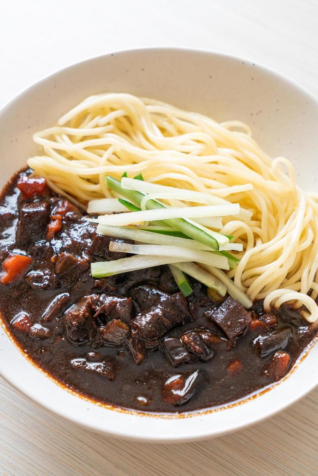 Jajangmyeon or JJajangmyeon is Korean Noodle with Black Sauce photo