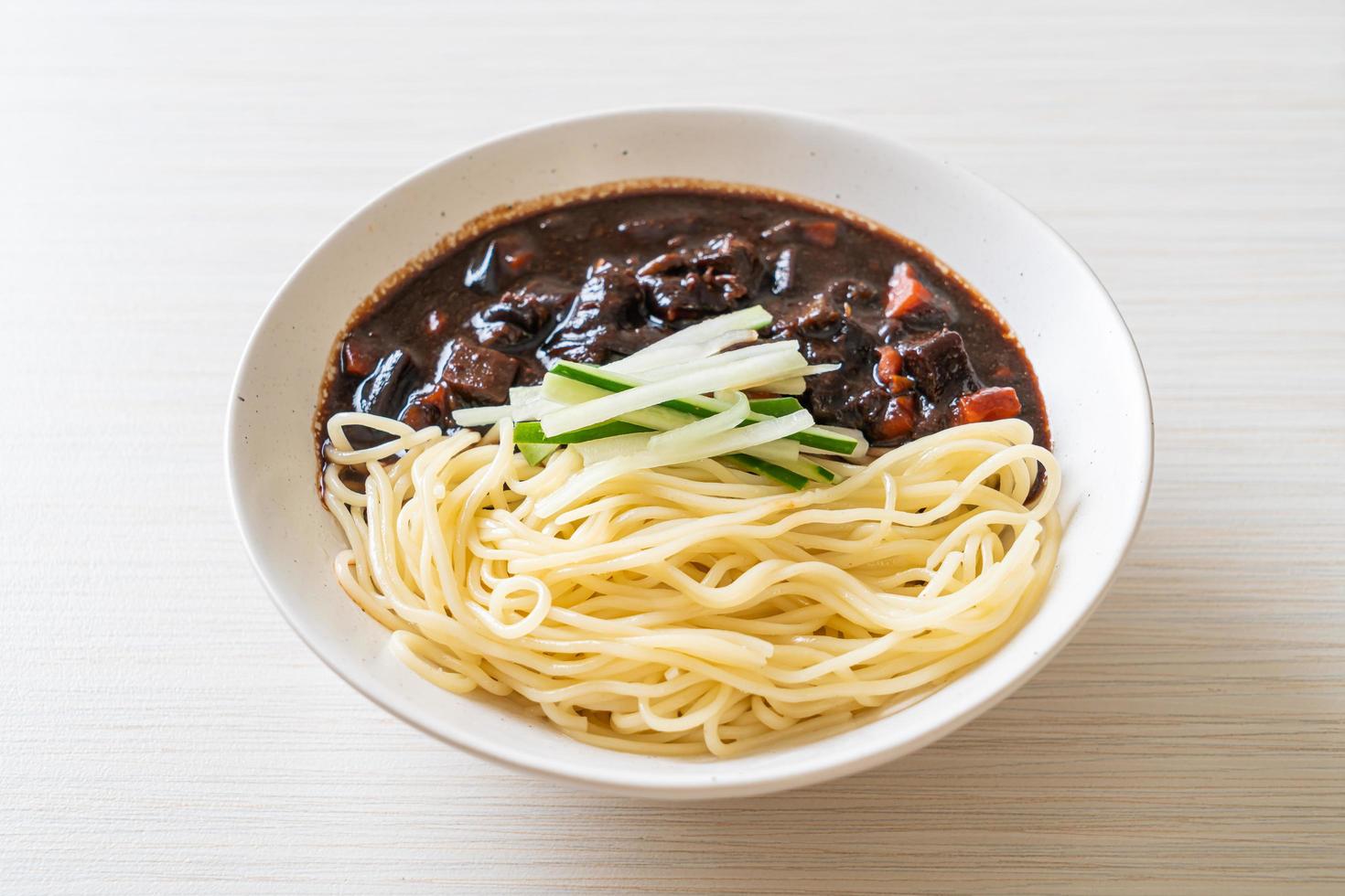 Jajangmyeon or JJajangmyeon is Korean Noodle with Black Sauce photo