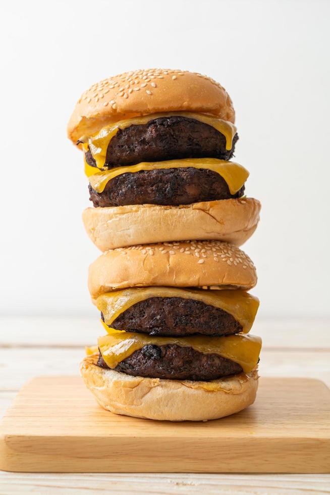 Hamburger or beef burgers with cheese - unhealthy food style photo