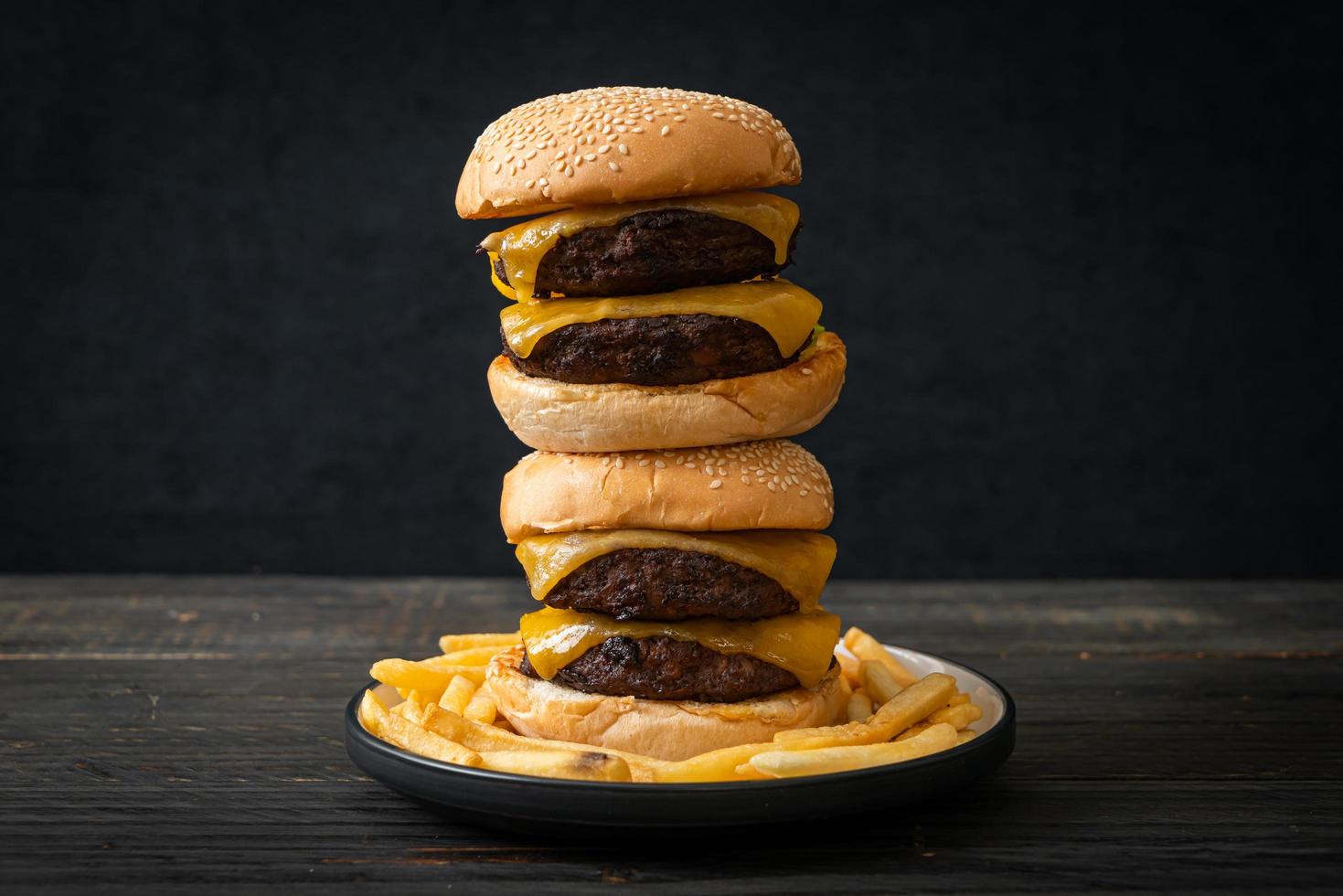 Hamburger or beef burgers with cheese - unhealthy food style photo