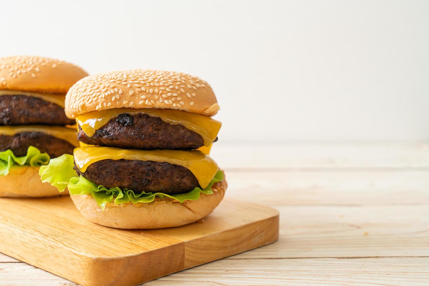 Hamburger or beef burgers with cheese - unhealthy food style photo