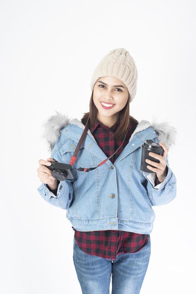 Beautiful traveller woman on white background photo