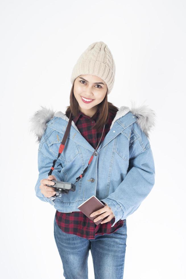 Beautiful traveller woman on white background photo