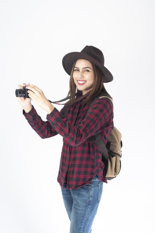 Beautiful traveller woman on white background photo