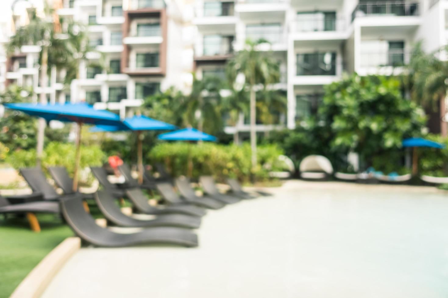 Abstract blur and defocused swimming pool in hotel and resort photo
