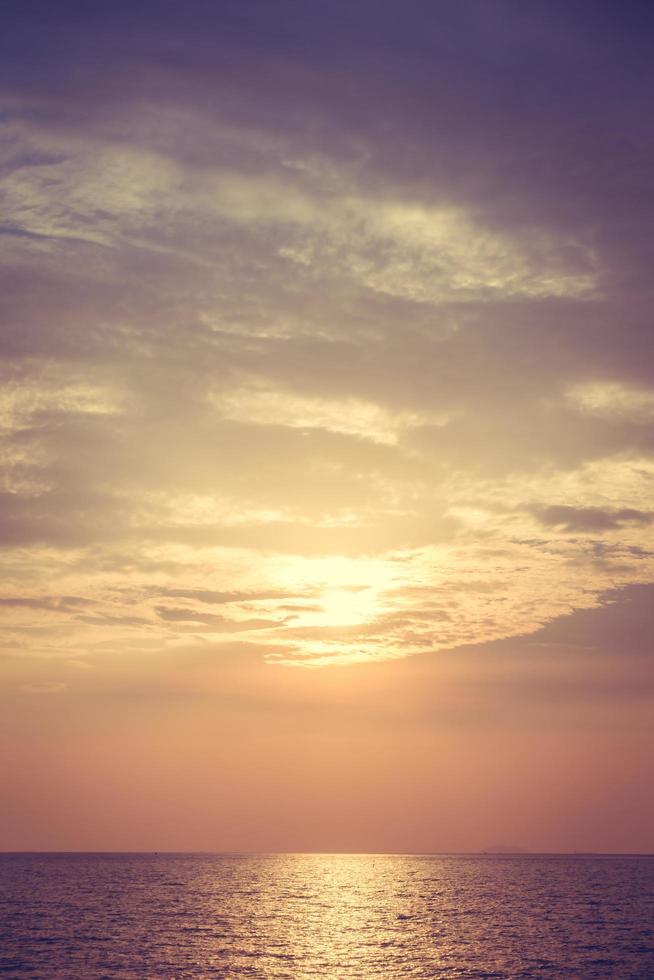 Beautiful sunset on the beach and sea photo