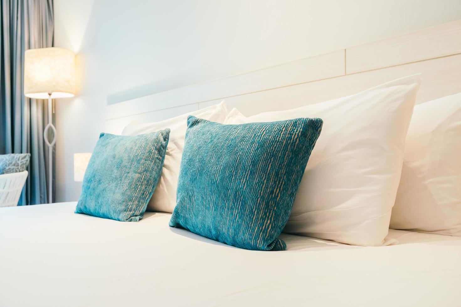 Pillow on bed photo