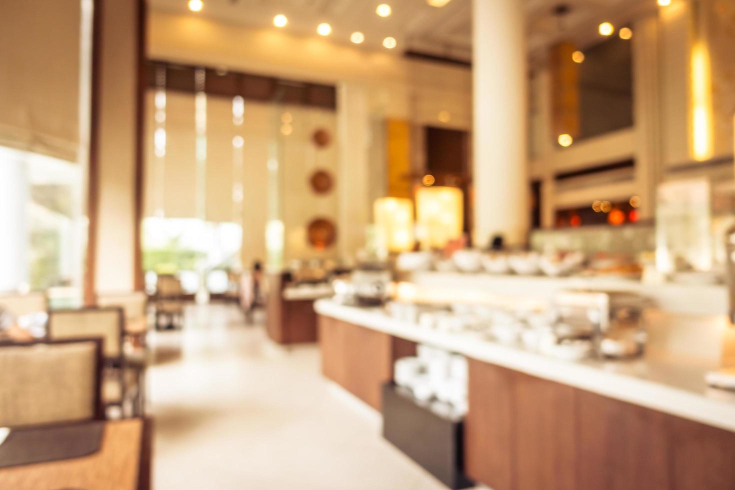 Abstract blur and defocused breakfast buffet at hotel restaurant interior photo