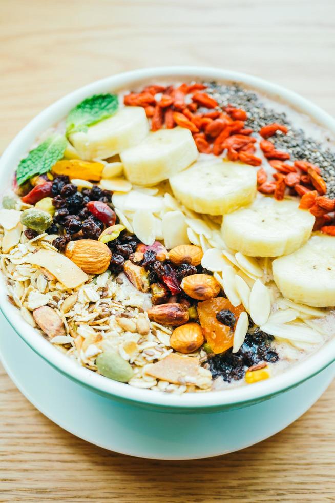 Mixed fruit with muesli and granola photo