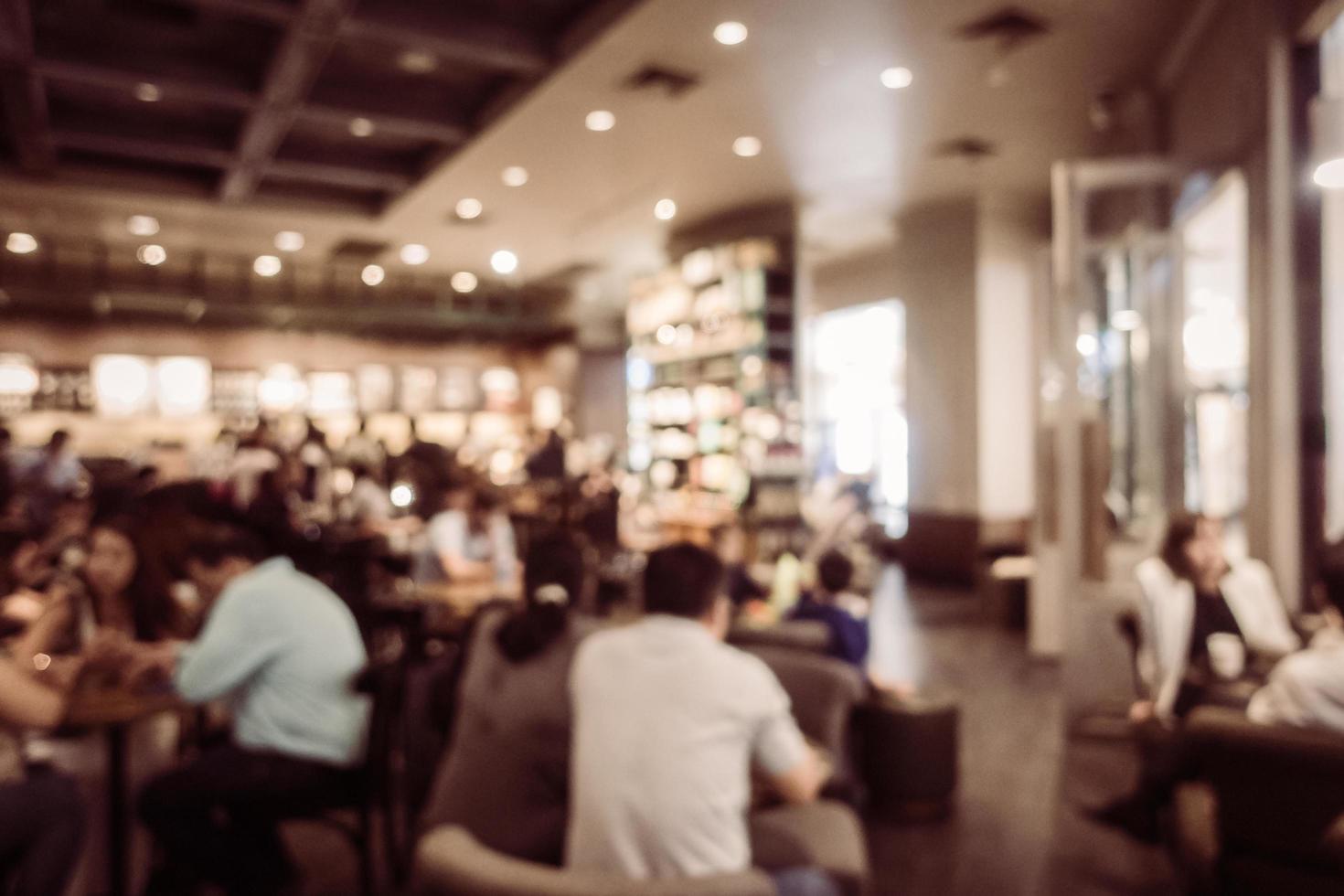 Abstract blur and defocused coffee shop cafe and restaurant interior photo
