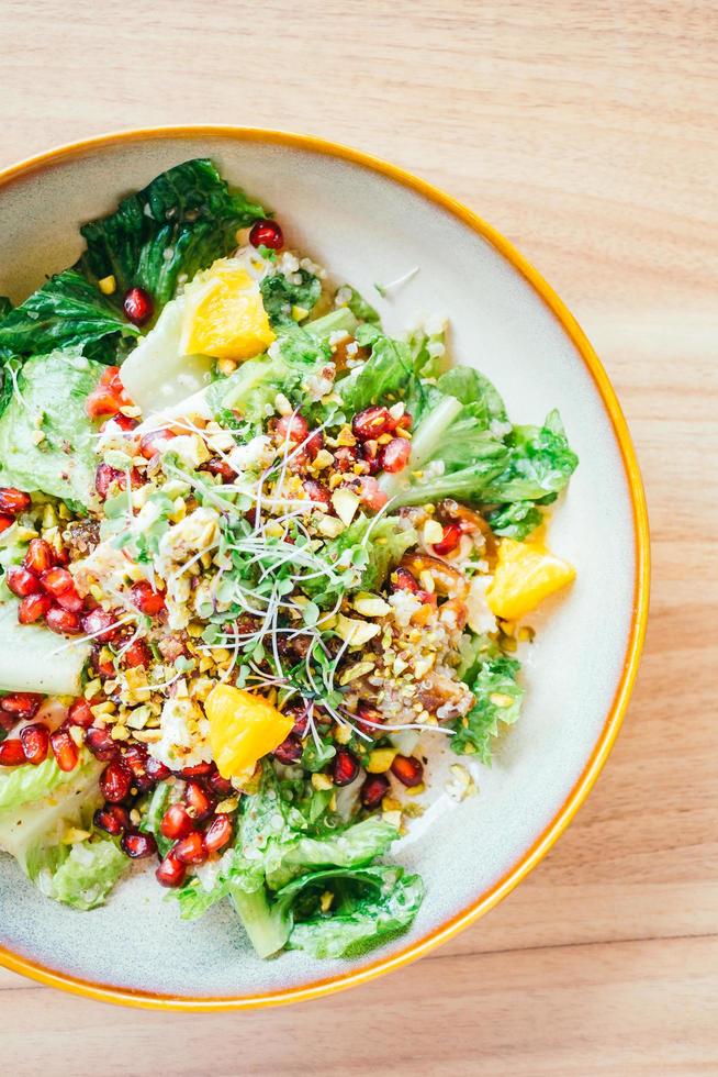 Grilled chicken with vegetable and pomegranate , fruits salad in plate - Color Filter Processing photo