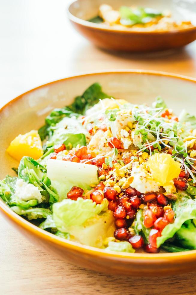 Grilled chicken with vegetable and pomegranate , fruits salad in plate - Color Filter Processing photo