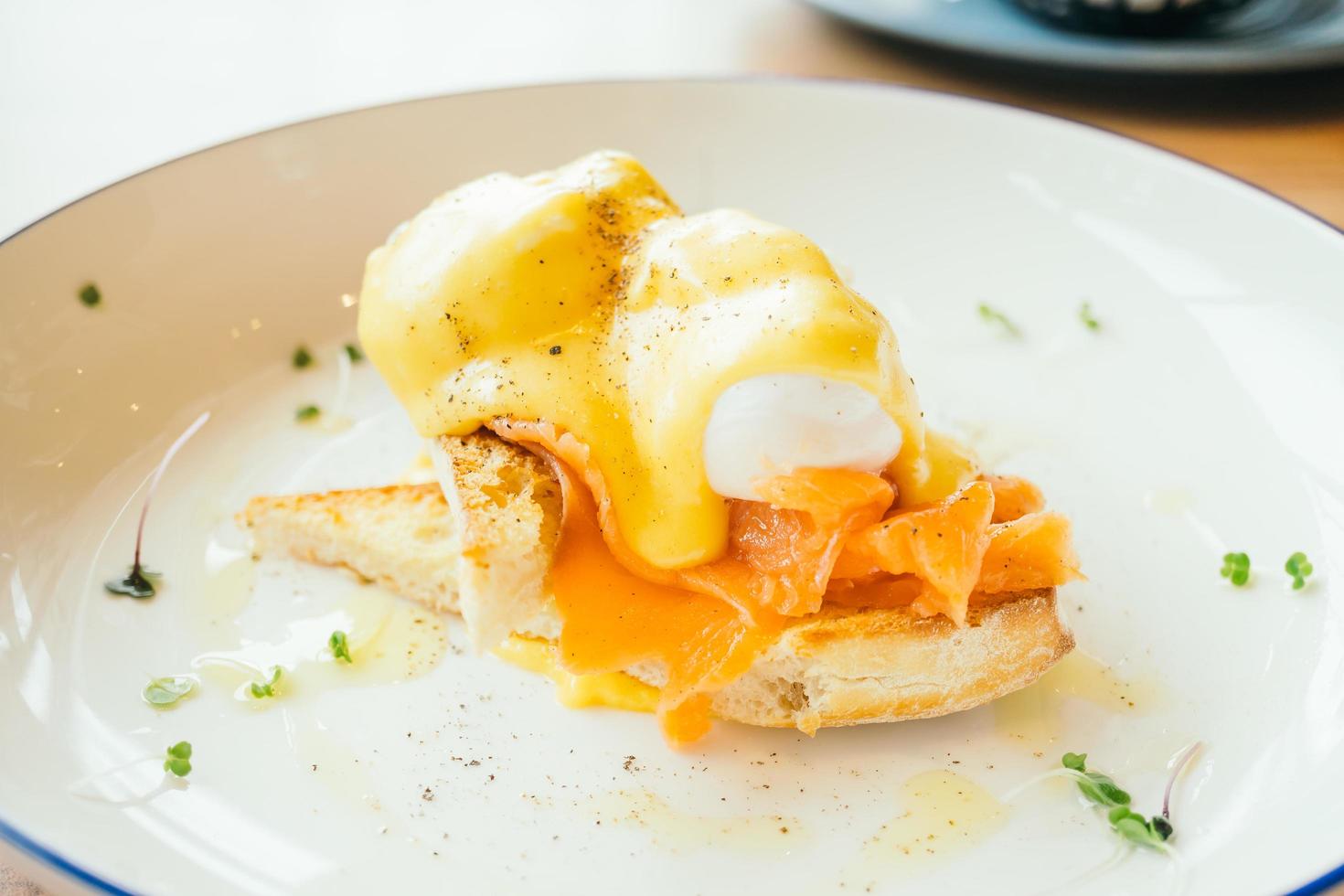 Eggs benedict with smoked salmon for breakfast photo