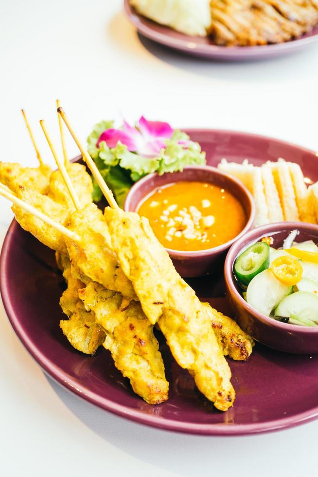 Chicken meat satay photo