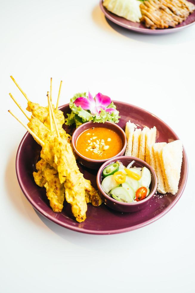 Chicken meat satay photo