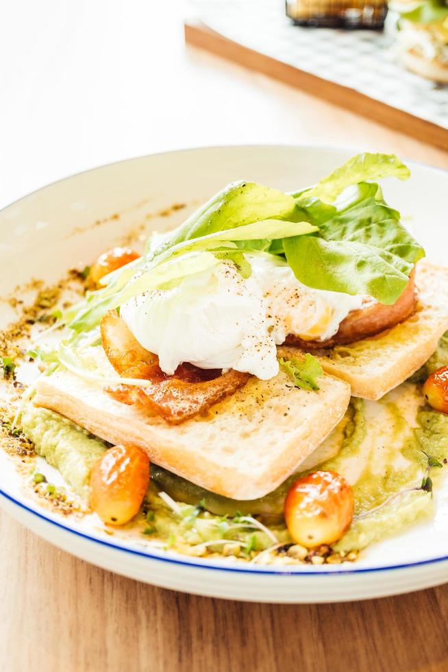 Poached egg with avocado sauce photo