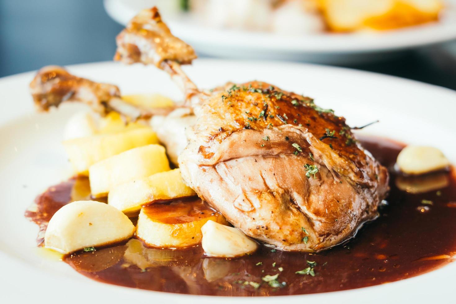 Duck breast steak in white plate photo