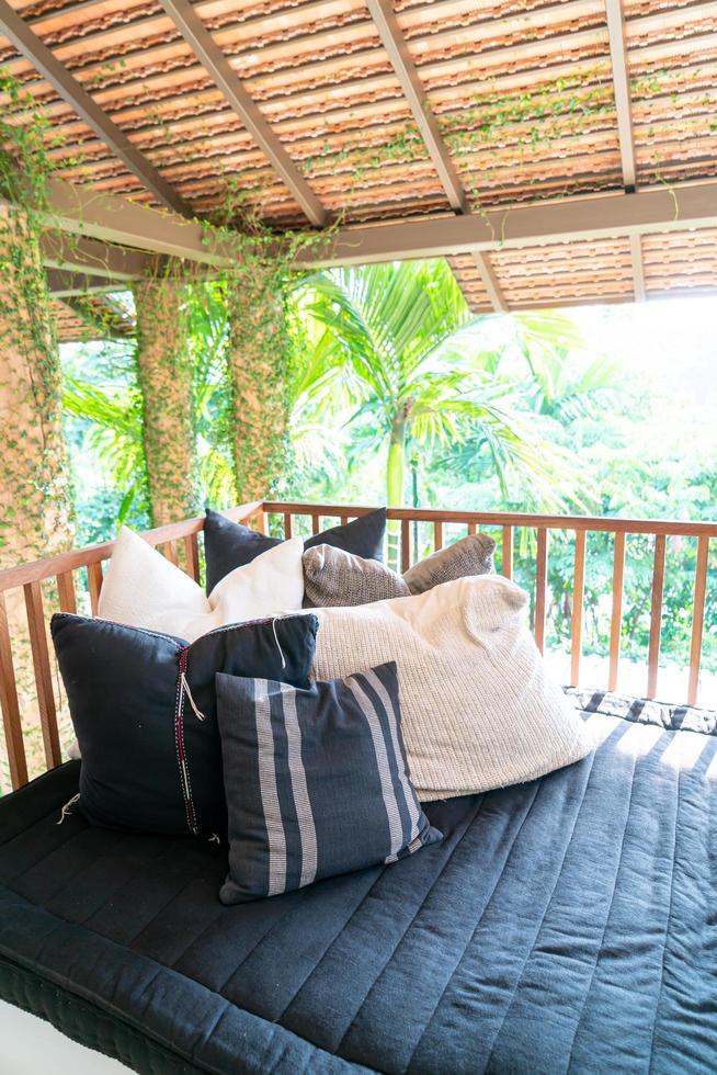 Pillow decorates on sofa on balcony terrace photo