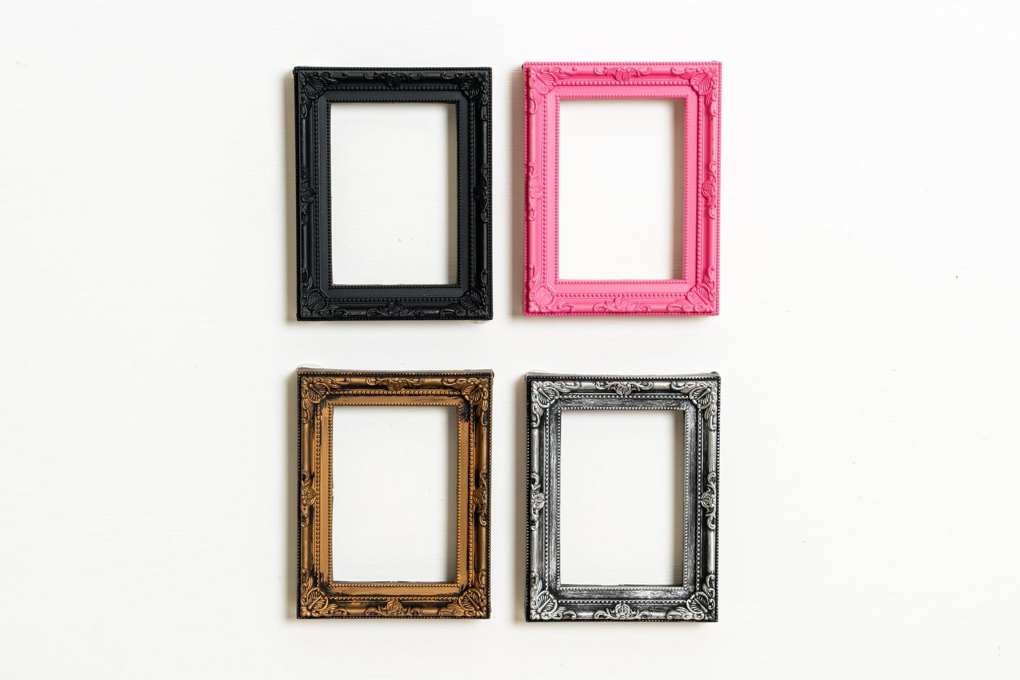 Empty picture frame on white wall background with copy space photo